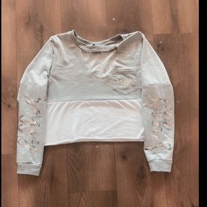 Rue 21 “Sassy” long sleeve crop top